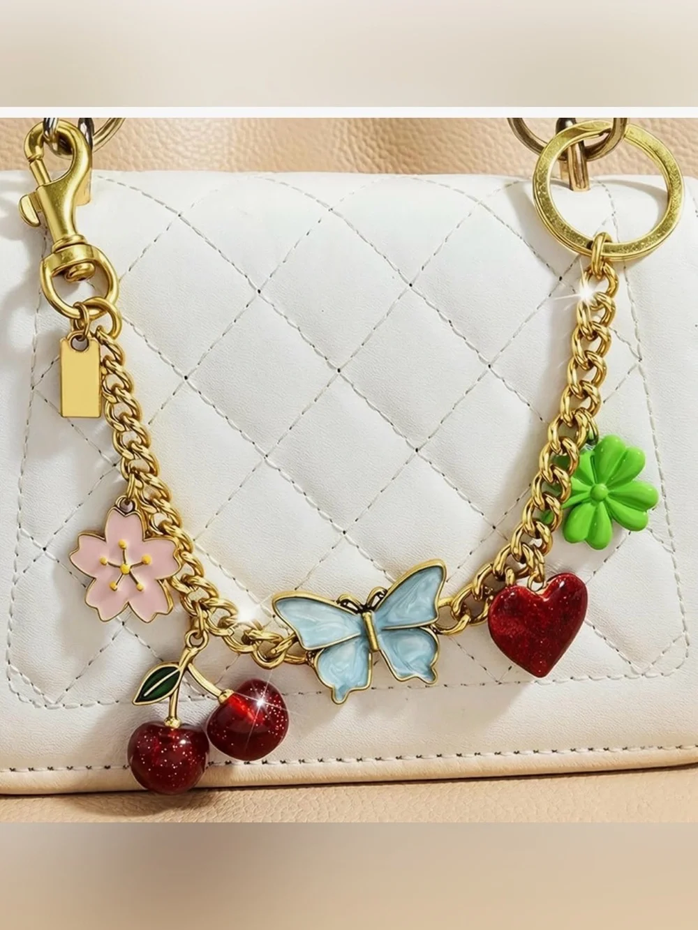 Designer inspired bag charm chain.